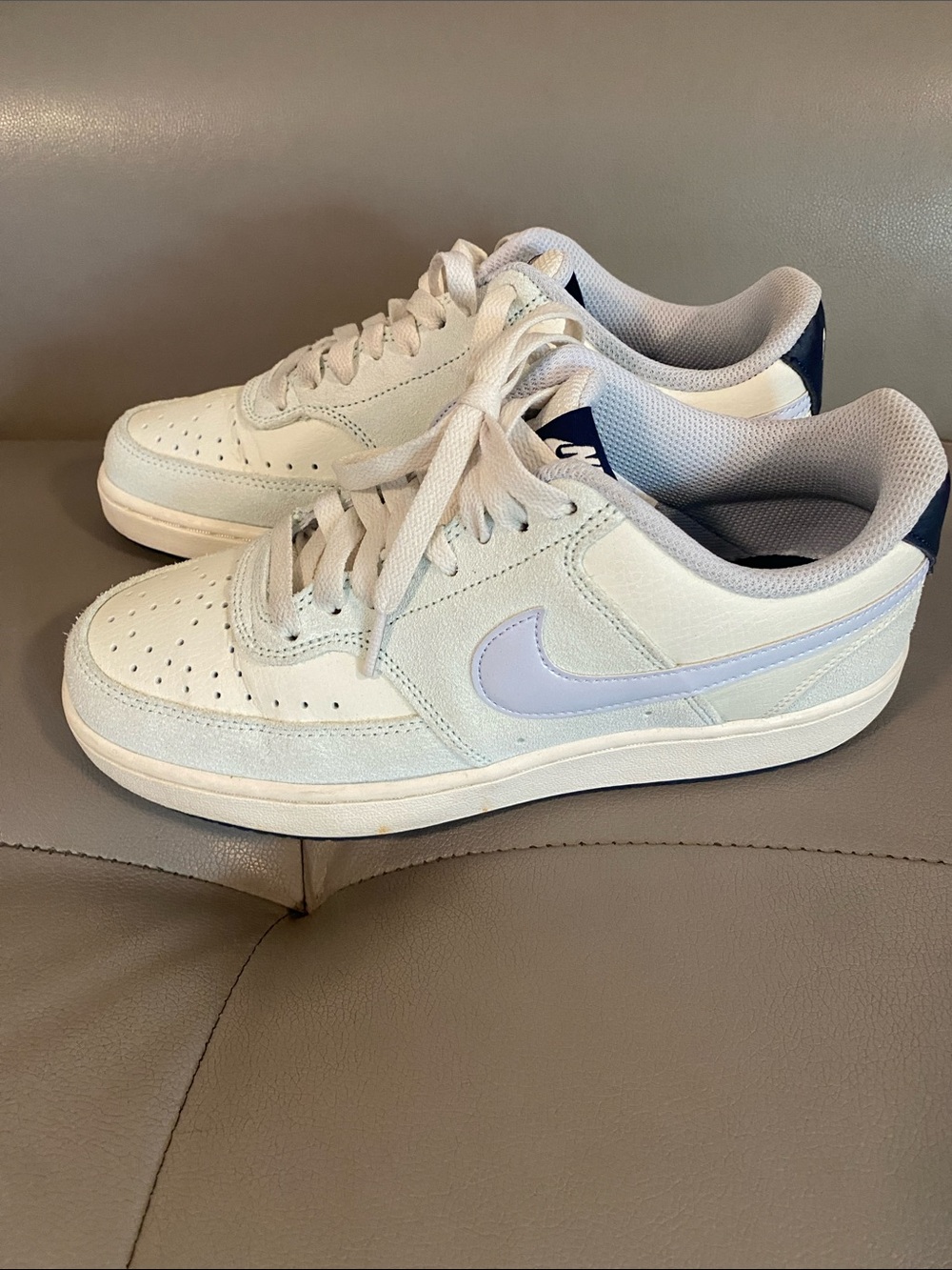 Nike White Sneakers with Light Blue Swoosh and Navy Heel